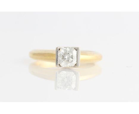 A diamond solitaire ring, set with an octagonal cut diamond, measuring approx. 0.70ct, stamped 750, ring size M½.