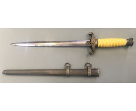 A Nazi German Army (Heer) dagger WNW Waffen with cream handle.