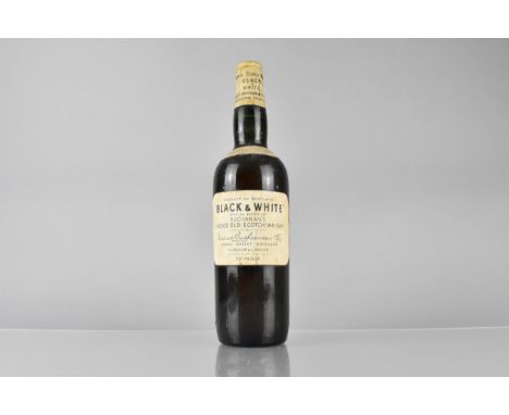 A Bottle of "Black and White" Special Blend of Buchanan's Choice Old Scotch Whisky, Spring Cap 