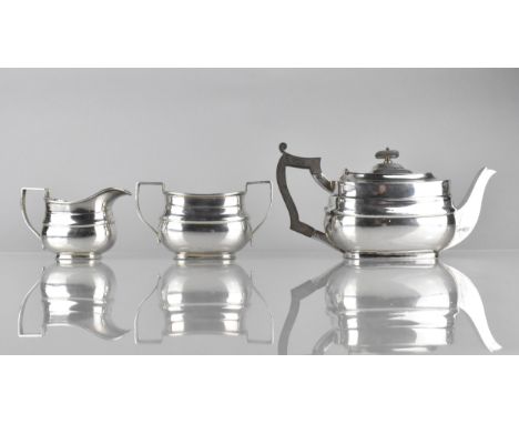 An Edwardian Silver Three Piece Bachelor's Tea Service by William Hutton &amp; Sons Ltd to Comprise Teapot, Milk jug and Suga