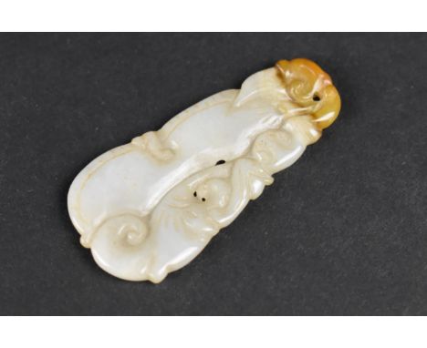 A Carved Jade Pendant Modelled as Gourd, 5cms Long 