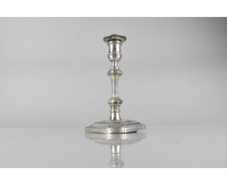 A George V Silver Candlestick by Hawksworth, Eyre and Co Ltd, on Tapering Square Canted and Weighted Base, Birmingham 1934 Ha