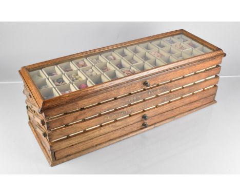 An Edwardian Haberdashery Counter Top Display Cabinet for 'Clark's "Anchor" Standard Cotton for Embroidery', in Oak with Glaz