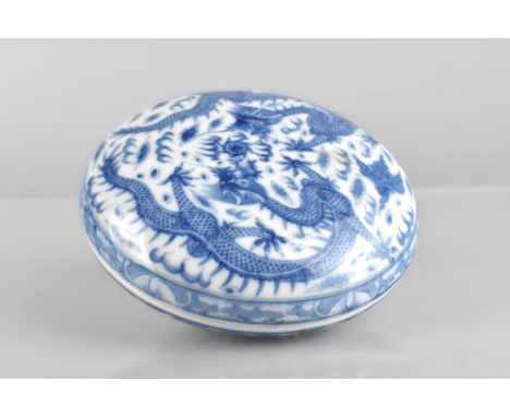 A Chinese Porcelain Blue and White Circular Box and Cover Decorated with Dragons and Flaming Pearl, Seal Mark to Base, 13cm D