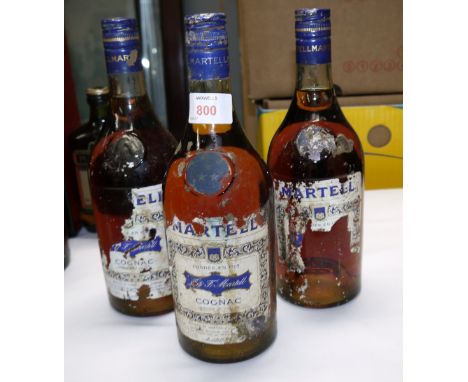 Three bottles of Martell Cognac (labels a.f.)