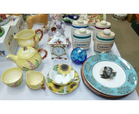 A Carlton 4 piece tea set; a Royal Albert "Old Country Roses" clock; 4 china spirit bottles; a Coalport figure:  First Waltz;