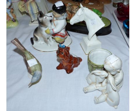 A Soviet Russian group Eskimo and dog, a Katzhütte bisque group, a Royal Worcester bust Pyros, a Goebel dog and bird