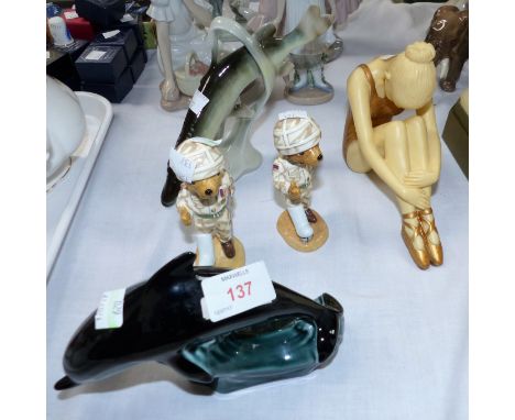 A Poole Dolphin; a Royal Dux trout; 2 John Beswick figures dogs in army uniform and a resin ballerina