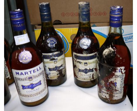 Four bottles of Martell Cognac (3 labels a.f.)