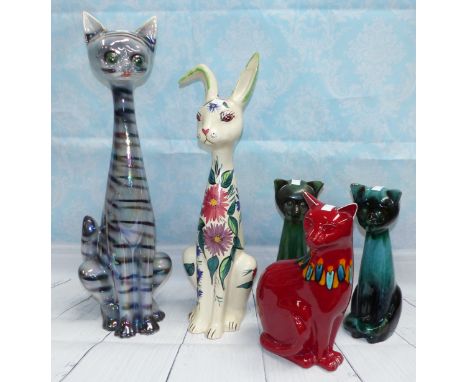 A large Jema elongated cat; an Arthur Wood elongated cat (a.f.); 2 "Blue Mountain" cats; a 1970's Poole cat