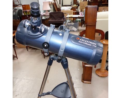 A Celestron Astro Master 114 reflecting telescope, aluminium coated primary parabolic mirror, 1000mm focal length, f/9 focal 