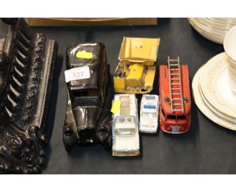 Four old play worn diecast vehicles and another to include Dinky and Corgi