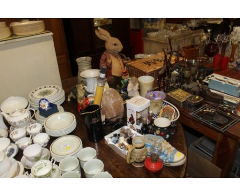 A quantity of various decorative ornaments including a Murano style glass clown, a resin rabbit figure, miniatures etc.