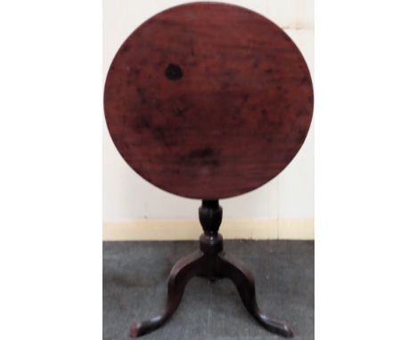 19th century Mahogany tilt top table on tripod supports. Approx. 101cm H x 58cm Diameter

Used condition, scuffs and scratche
