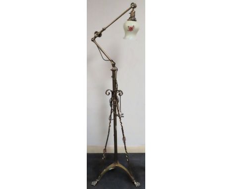 Victorian style brass adjustable freestanding lamp with glass shade. Approx. 218cm H

Reasonable used condition, not tested f