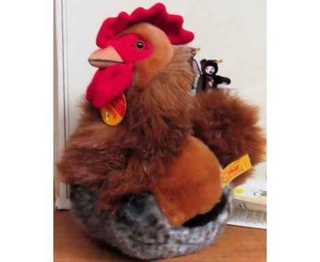 Boxed Steiff "Spotti Hahn 20" Hen

Reasonable used condition, box tarnished 