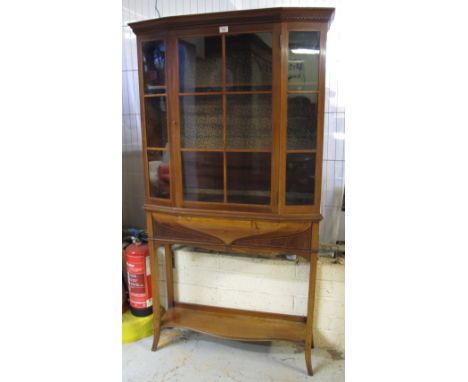 Edwardian mahogany inlaid break front display cabinet with under shelf, on splay legs.(B.P. 24% incl. VAT)