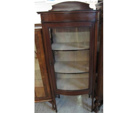 Edwardian mahogany bow fronted, single door glazed display cabinet on square tapering legs.(B.P. 24% incl. VAT)