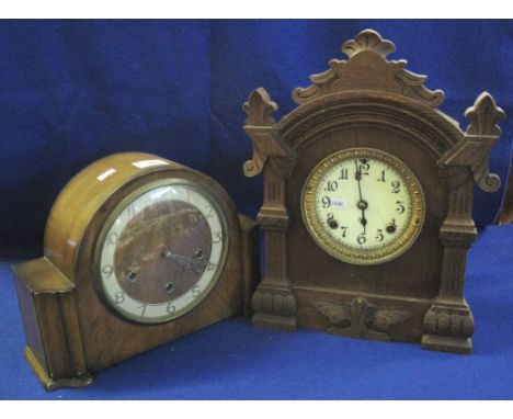 Oak gingerbread type mantel clock and a mid Century mahogany three train mantel clock. (2)(B.P. 24% incl. VAT)