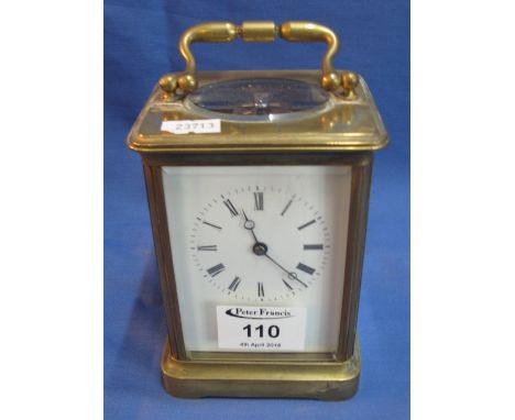 Late 19th Century French brass carriage clock with full depth Roman enamel dial.  14.5cm high.(B.P. 24% incl. VAT)   CONDITIO