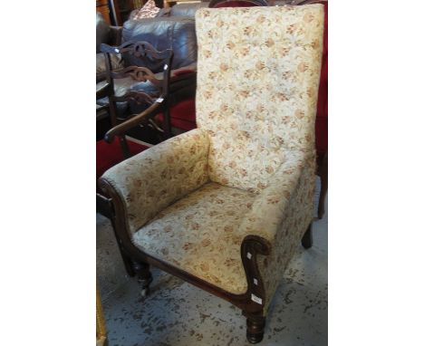 Victorian mahogany upholstered, button back easy armchair on baluster turned legs and ceramic casters.(B.P. 24% incl. VAT)