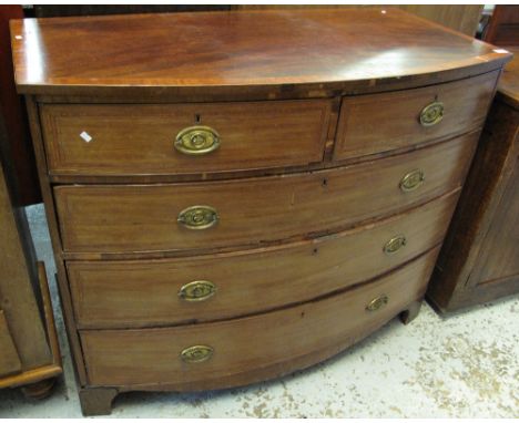 19th Century mahogany inlaid, bow fronted chest of two short and three long drawers, standing on bracket feet.(B.P. 24% incl.