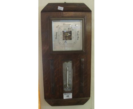 Mid Century oak mounted aneroid barometer with square face and separate thermometer.  43cm high approx.(B.P. 24% incl. VAT)