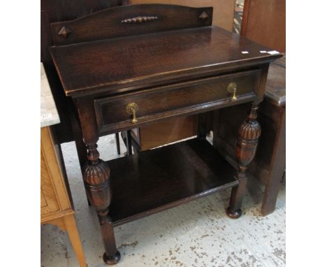 Early 20th Century oak single drawer side table on fluted supports and under shelf.(B.P. 24% incl. VAT)