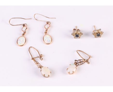 Two pairs of yellow metal mounted opal drop earrings; together with a pair of 9ct gold stud earrings, total weight 3.3g.