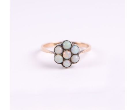 An opal cluster ring set in silver and 9ct gold shank, approx UK size 'M', 1.g.