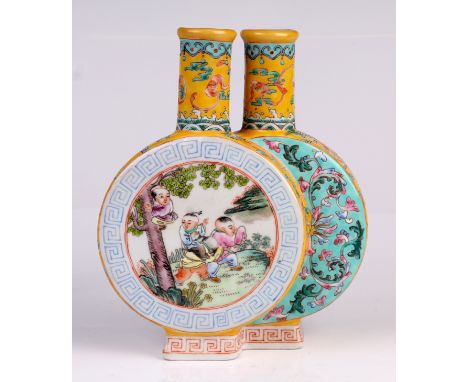 A Chinese famille jaune conjoined moon flask double vase, decorated boys at play on a yellow ground with red seal mark to the