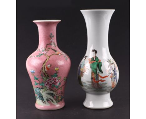 A Chinese famille rose baluster vase decorated with flowers on a pink sgraffito ground, blue seal mark to the underside, 24cm