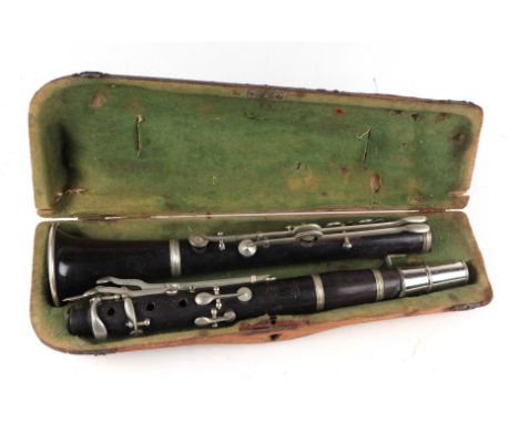 A Jul. Heinr Zimmermann clarinet in a pine case.