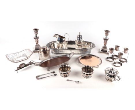 A quantity of silver plated items to include candlesticks, trays, tea caddy and sugar caster.