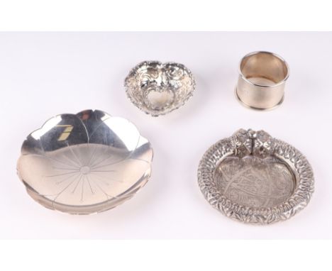 Two silver pin dishes; together with a silver napkin ring and a white metal bangle converted to a pin dish (4).