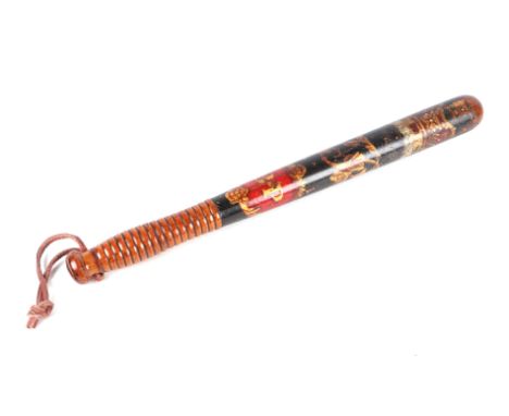 A Victorian painted and gilded policeman's truncheon, initialled 'BP', 44cms long.