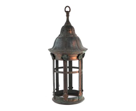 An Arts & Crafts style copper hall lantern with verdigris patination, 65cms high. 