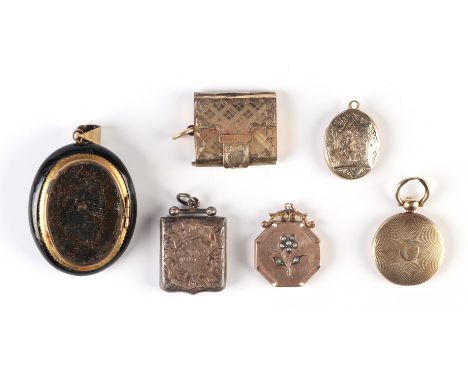 A group of 19th century and early 20th century pendant lockets to includes yellow metal, silver and enamel examples (6)