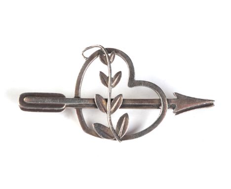 A Georg Jensen silver brooch designed by Arno Malinowski, modelled as an arrow and heart with scrolling leaves, numbered 242H