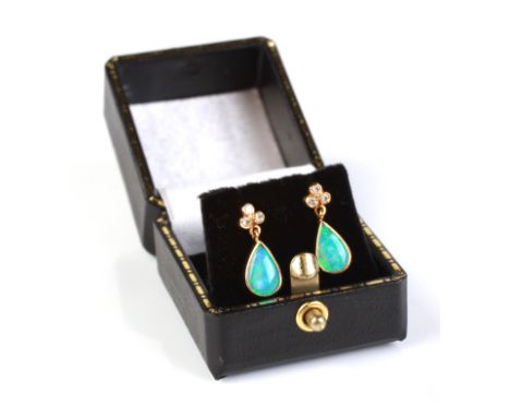 A pair of 18ct gold opal and diamond drop stud earrings, boxed.Condition ReportThe total height of the earrings is 16mm and t