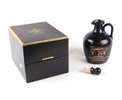 Presentation box of QE2 Highland Malt Scotch Whisky, by Morrison Bowmore Ltd, black ceramic with gilt lettering, single handl