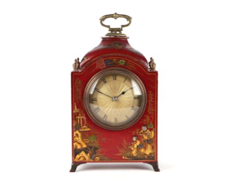 A late 19th / early 20th century French mantle clock, the gilt metal dial with Roman numerals, in a chinoiserie lacquered cas