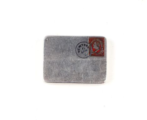 A Victorian American sterling silver and enamel stamp case in the form of an envelope with American stamp and postmark on the