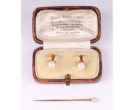 A pair of 9ct gold pearl dress studs, 2.2g, boxed, together with a yellow metal and pearl stick pin, 