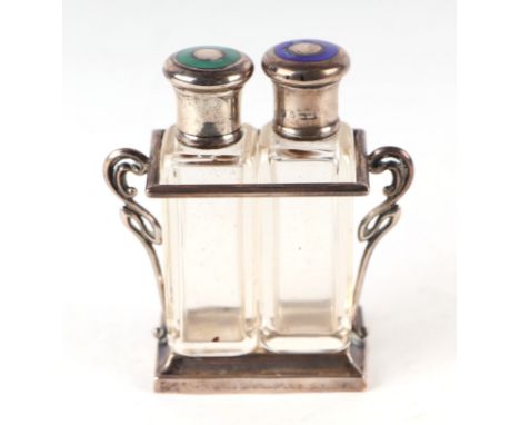 A pair of George V silver and enamel topped glass scent bottles on silver stand,  Birmingham 1915 and makers marks for  Charl