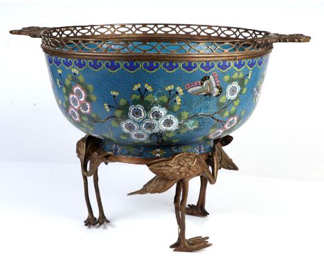 A 19th century Chinese ormolu mounted cloisonne punch bowl, decorated butterflies and flowers on a turquoise ground, the stan