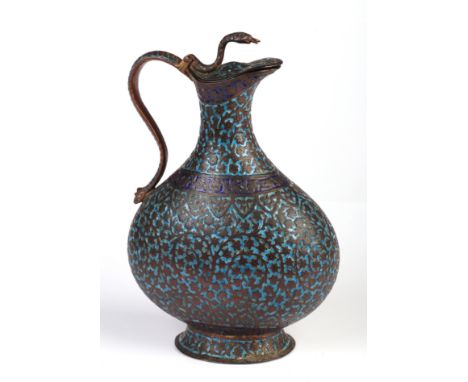 A Kashmir/ Mughal Indian enamel on gilded copper water jug with serpent handle, 22cm high 