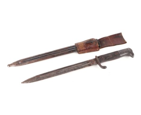 A Third Reich dress bayonet in its steel scabbard with leather frog. Indistinct makers mark to the ricasso. Blade length 25cm