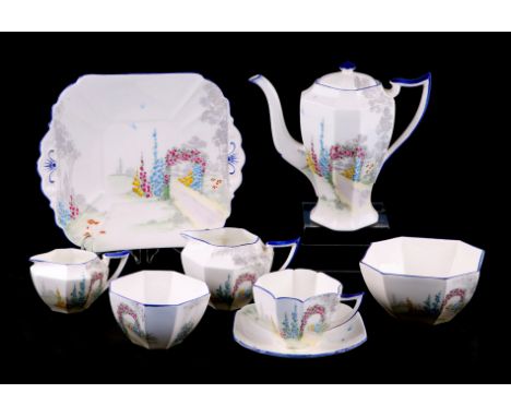 A Shelley Art Deco 'Archway of Roses' pattern cabinet set; together with another similar fruit set (a/f).Condition ReportThe 