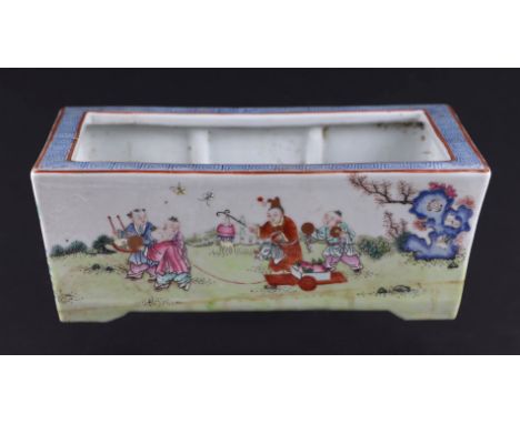 A Chinese famille rose rectangular planter decorated with figures in a landscape, seal mark to the underside, 25cm wide. Cond